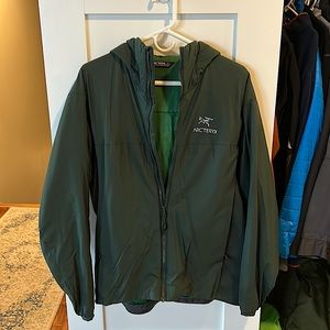 Arc’teryx puff jacket with hood.